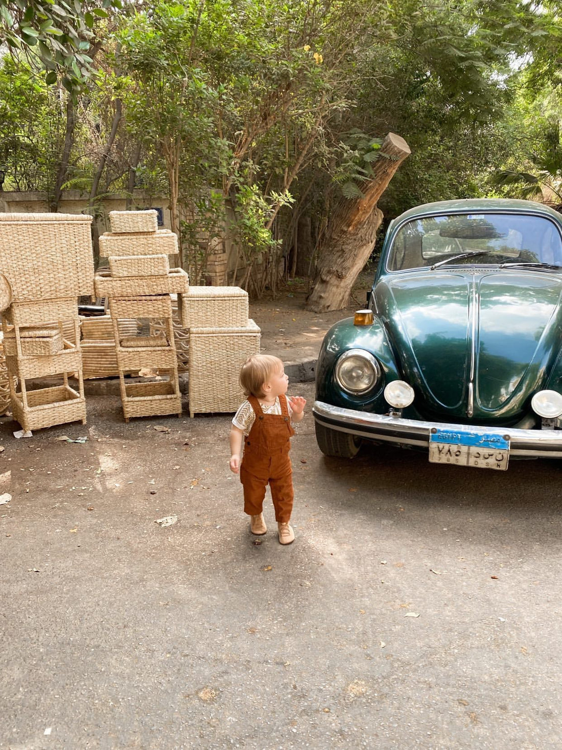 Minimalist toddler outfit with sunglasses and stay-on baby boots — perfect barefoot shoes for travel, parks, and everyday play